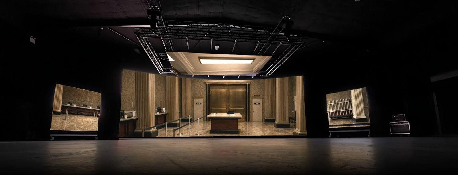 A bank lobby set playing on an LED volume in a dark studio